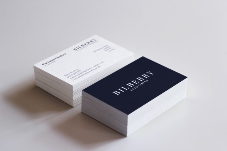 A stack of professionally designed business cards by Square One Digital